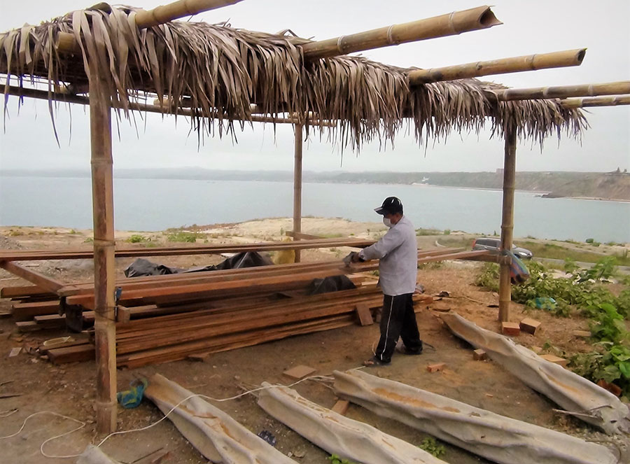 Pic-8-sanding-lumber-under-shade-structure.jpg